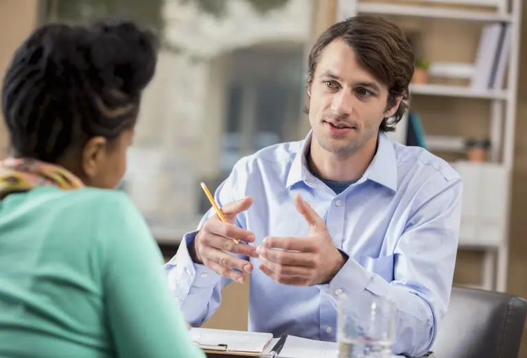 Person talking to another person