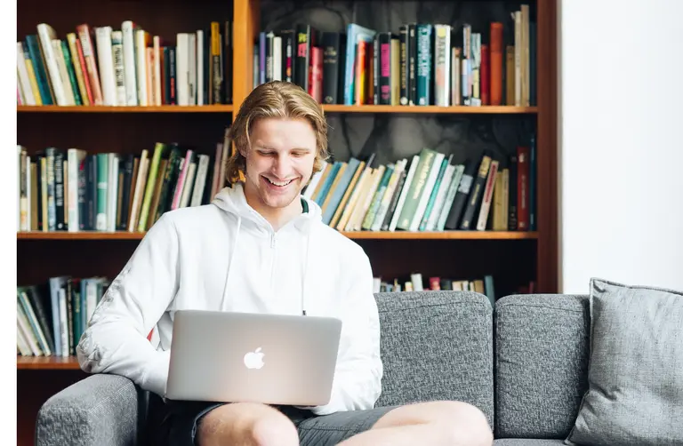 Man typing on laptop