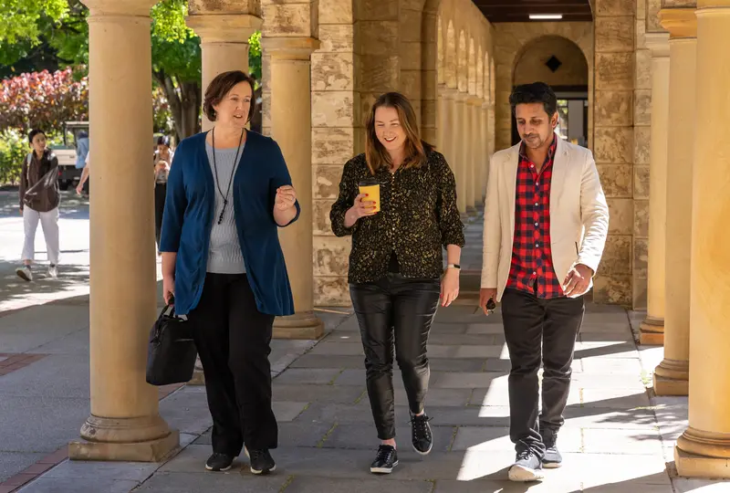 Staff Photoshoot - Walking along columns-1.jpg