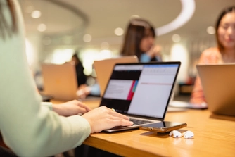 Students studying inside Reid Library.
